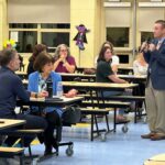 Dr. O'Black addresses the forum