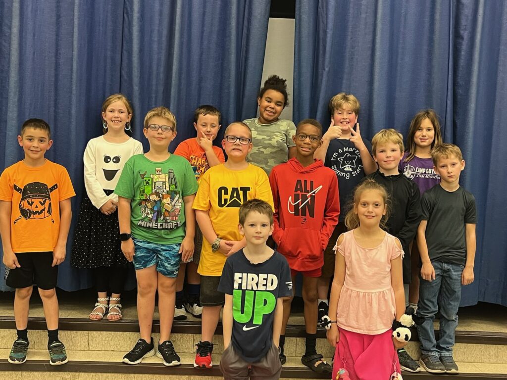 Students pose at the October red carpet