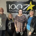 SASD staff pose with Bubba and Melanie from Star 100.7