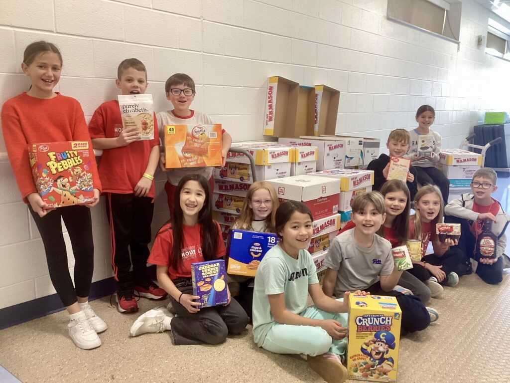 Students smile with donations