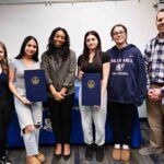 Rep Powell miles with students