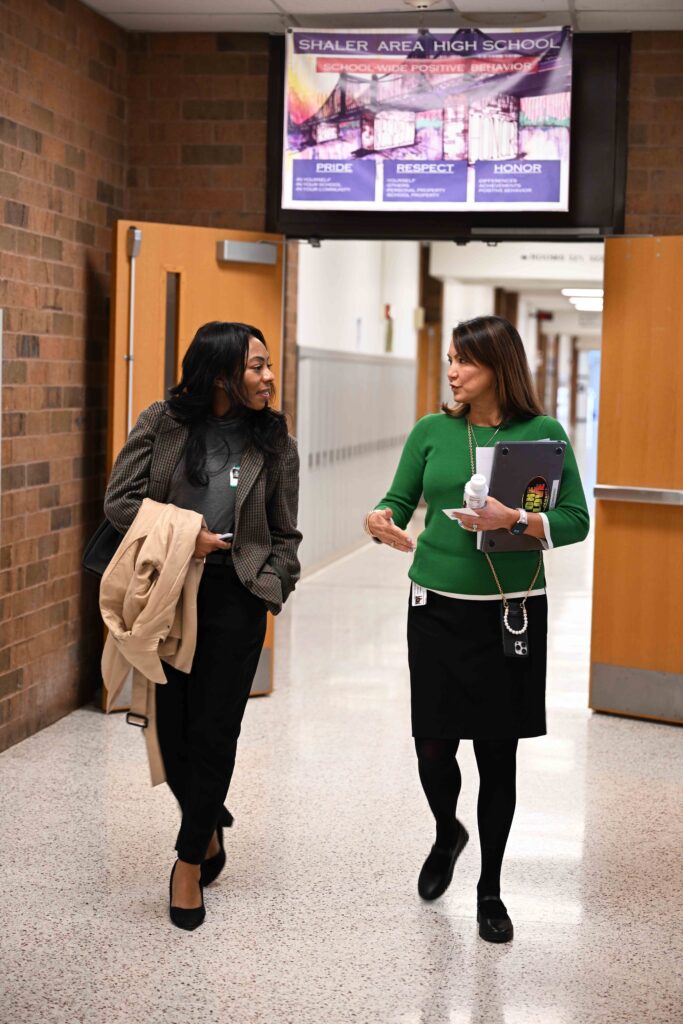 Rep Powell speaks with interim principal Joanne Townsend