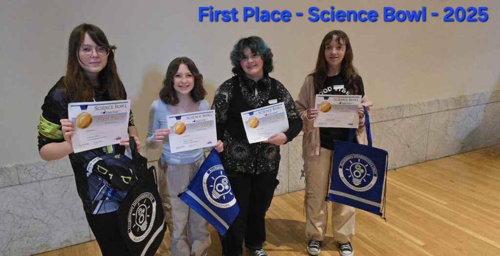 Students show their first place certificates