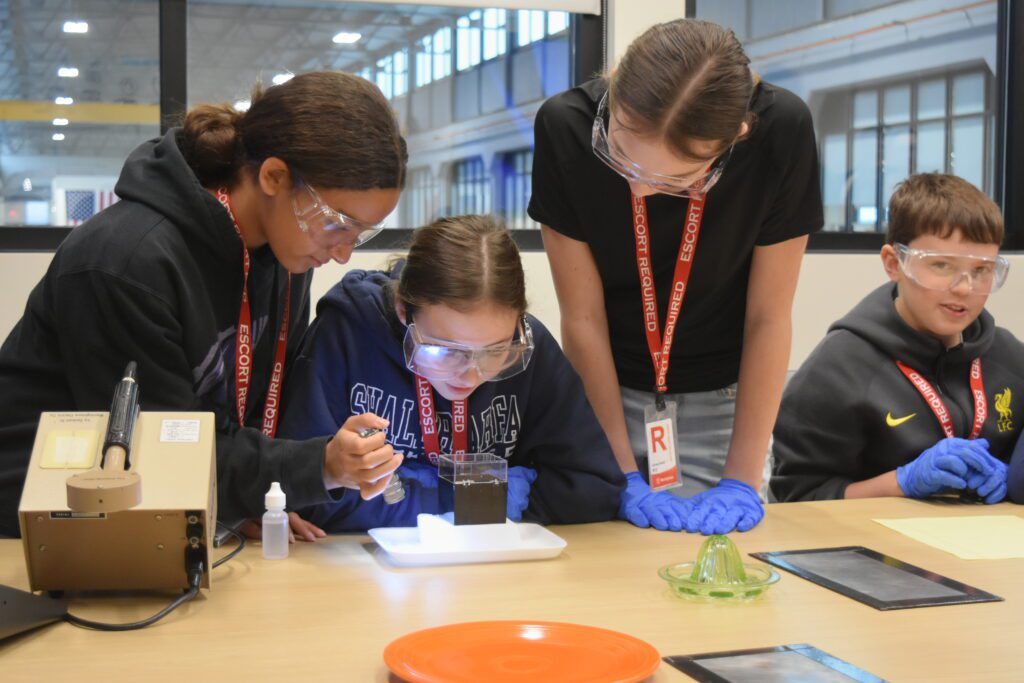 Students study something with focus and curiousity