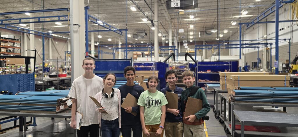 Students film as part of What's So Cool about Manufacturing